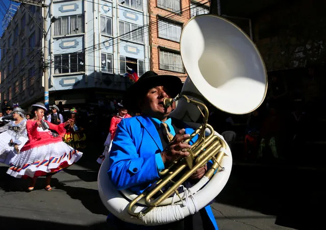 A musician performs during the “Senor del Gran Poder” (Lord of Great Power) parade in La Paz, May 21, 2016. (Photo by David Mercado/Reuters)
