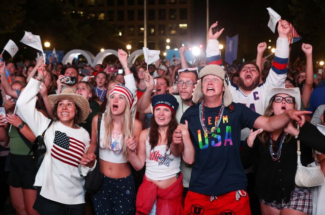 People celebrate the announcement, as Salt Lake City is officially awarded the rights to host the 2034 Winter Olympic and Paralympic Games, in Salt Lake City, Utah, U.S., July 24, 2024. (Photo by Jim Urquhart/Reuters)