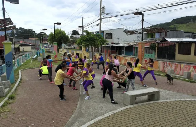 Women take part in an aerobics class in Los Guidos de Desamparados July 23, 2015. (Photo by Juan Carlos Ulate/Reuters)