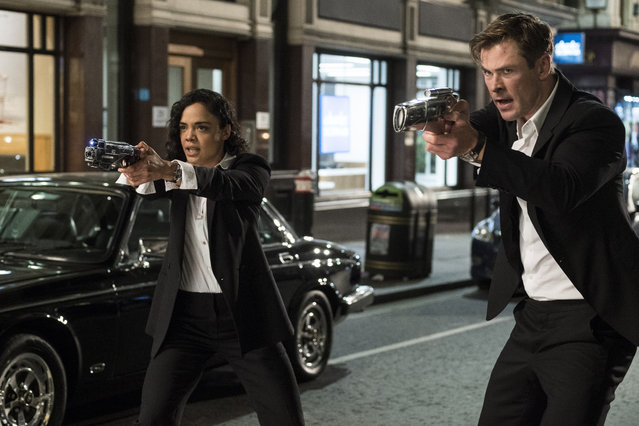 This image released by Sony Pictures shows Tessa Thompson and Chris Hemsworth in a scene from Columbia Pictures' “Men in Black: International”. (Photo by Giles Keyte/Sony/Columbia Pictures via AP Photo)