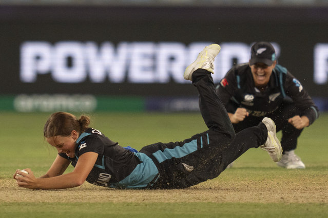 New Zealand's captain Sophie Devine, right, reacts as Eden Carson takes the catch to get the wicket of Pakistan's Omaima Sohail during the ICC Women's T20 World Cup 2024 match between Pakistan and New Zealand at Dubai International Stadium, United Arab Emirates, Monday, October 14, 2024. (Photo by Altaf Qadri/AP Photo)