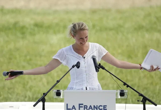 Marion Marechal Le Pen, deputy of Vaucluse, delivers a speech as she kicks off her National Front (FN) electoral campaign for the presidency of Provence-Alpes-Cote d'Azur Regional Council (PACA) in Le Pontet next to Avignon, France July 5, 2015. (Photo by Philippe Laurenson/Reuters)