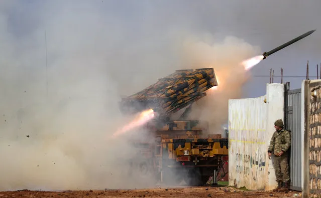 A Turkish military mobile rocket launcher fires from a position in the countryside of the Syrian province of Idlib towards Syrian government forces' positions in the countryside of neighbouring Aleppo province on February 14, 2020. (Photo by Omar Haj Kadour/AFP Photo)