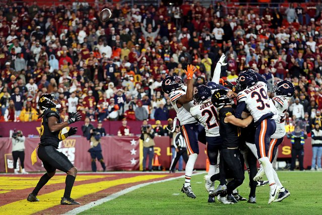 Washington Commanders wide receiver Noah Brown (85) catches a Hail Mary pass that was tipped with no time left to beat the Chicago Bears at Commanders Field in Landover, Maryland on October 27, 2024. (Photo by Peter Casey/USA Today Sports)