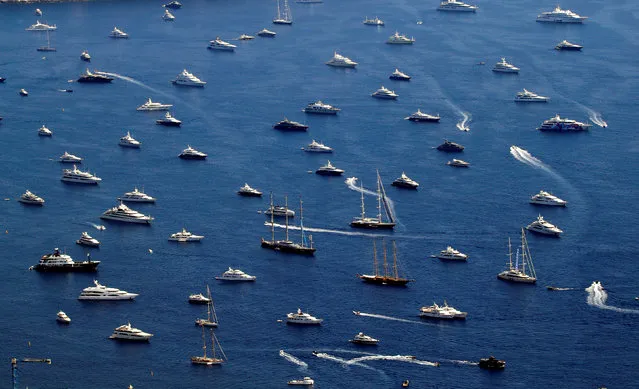 Luxury boats are seen during the Monaco Yacht show, one of the most prestigious pleasure boat show in the world, highlighting hundreds of yachts for the luxury yachting industry and welcomes 580 leading companies, in the bay of Monaco, September 27, 2017. (Photo by Eric Gaillard/Reuters)