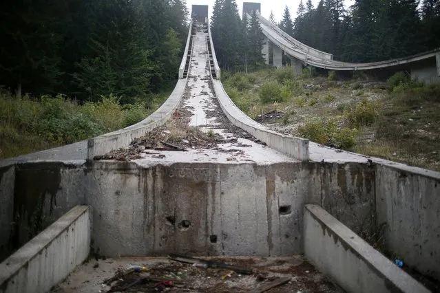 A view of the disused ski jump from the Sarajevo 1984 Winter Olympics on Mount Igman, near Sarajevo, September 19, 2013. Abandoned and left to crumble into oblivion, most of the 1984 Winter Olympic venues in Bosnia's capital Sarajevo have been reduced to rubble by neglect. (Photo by Dado Ruvic/Reuters)