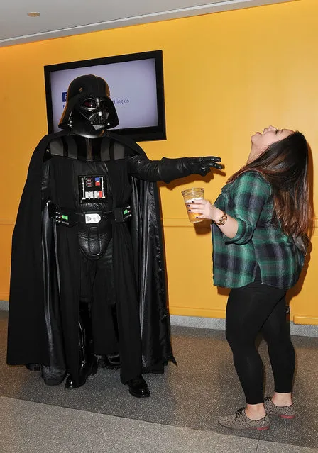 A Comic Con attendee poses as Darth Vader during the 2014 New York Comic Con at Jacob Javitz Center on October 9, 2014 in New York City. (Photo by Daniel Zuchnik/Getty Images)