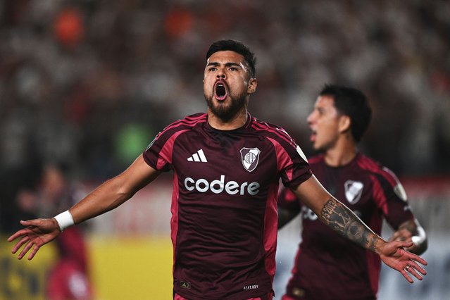 River Plate's Chilean defender #17 Paulo Diaz celebrates after scoring during the Copa Libertadores group stage first round football match between Peru's Universitario de Lima and Argentina's River Plate at he Monumental “U” Marathon stadium in Lima, on April 2, 2025. (Photo by Ernesto Benavides/AFP Photo)