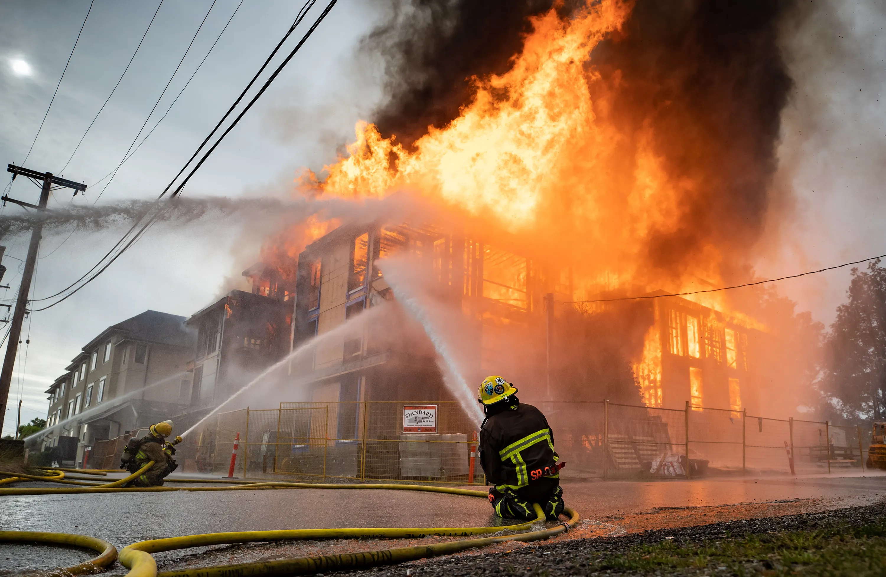 Next picture →. Firefighters battle a three-alarm fire at a four storey res...