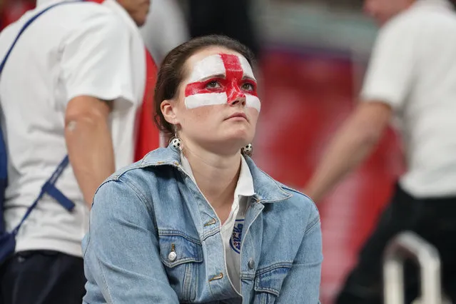 Saddened England fan in the stands after their side's loss after the FIFA World Cup Qatar 2022 quarter final match between England and France at Al Bayt Stadium on December 10, 2022 in Al Khor, Qatar. (Photo by Sorin Furcoi/Al Jazeera)