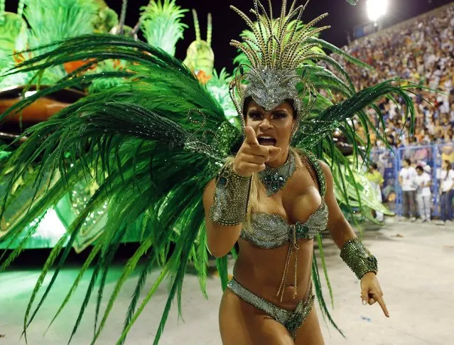 A reveller from the Vila Isabel samba school participates in the annual Carnival parade in Rio de Janeiro's Sambadrome February 12, 2013. (Photo by Sergio Moraes/Reuters)