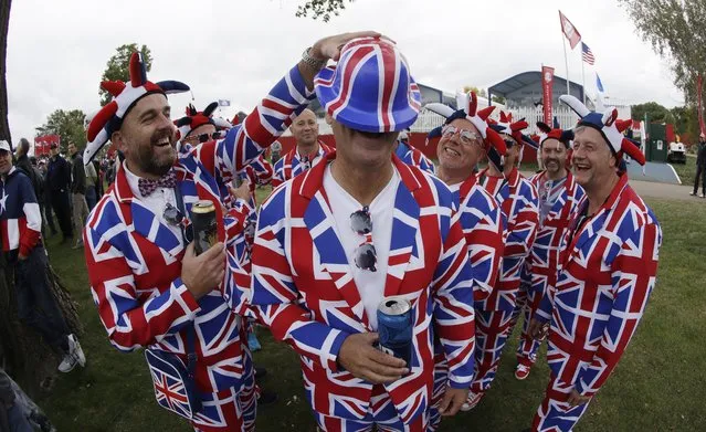 Fans from Lester, England have some fun on the 10th hole during a practice round for the Ryder Cup golf tournament Wednesday, September 28, 2016, at Hazeltine National Golf Club in Chaska, Minn. (Photo by Chris Carlson/AP Photo)