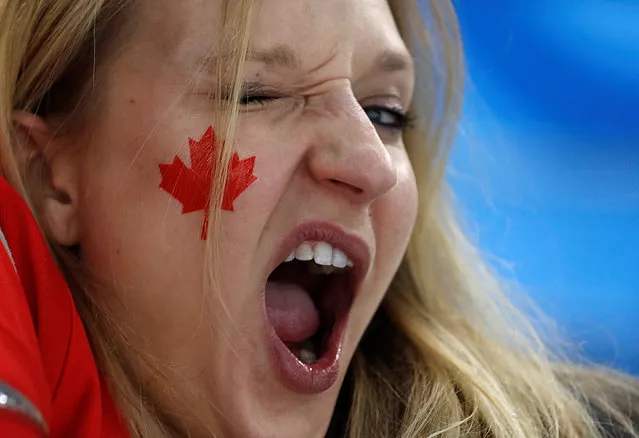 A fan reacts during the women' s semi- final ice hockey match between Canada and the Olympic Athlete’s from Russia during the Pyeongchang 2018 Winter Olympic Games at the Gangneung Hockey Centre in Gangneung on February 19, 2018. (Photo by Kim Kyung-Hoon/Reuters)