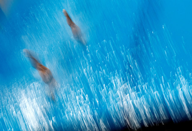Mexico's Zyanya Yunuen Parra Martin and Osmar Olvera Ibarra in action during the Mixed 3m Synchronised final at the World Aquatics Championships in Singapore on July 30, 2025. (Photo by Tingshu Wang/Reuters)
