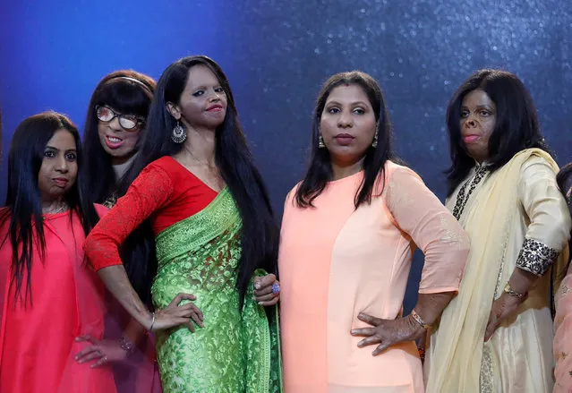 Acid attack survivors pose during a fashion show to mark International Women's Day in Thane on the outskirts of Mumbai, India on March 7, 2018. (Photo by Danish Siddiqui/Reuters)