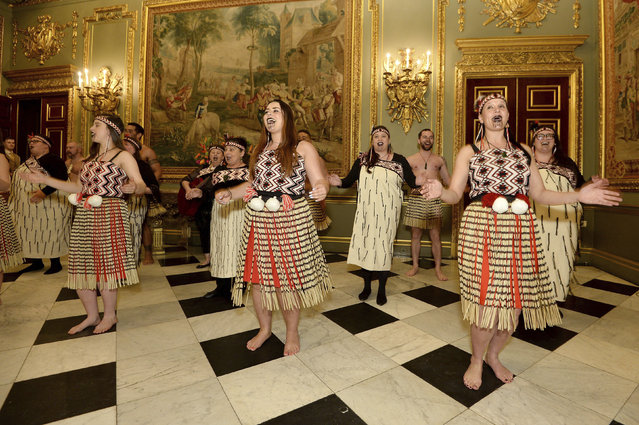 Performers at a reception held at Marlborough House, the home of the Commonwealth Secretariat in London, Monday March 12, 2018. Earlier members of the royal family attended the Commonwealth Service, at Westminster Abbey, the largest annual inter-faith gathering in the United Kingdom, organised by The Royal Commonwealth Society. (Photo by Jeff Spicer/Pool Photo via AP Photo)
