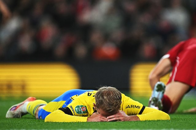 Southampton's Brazilian midfielder #13 Leo Scienza reacts after putting a header wide of an open goal during the English League Cup third round football match between Liverpool and Southampton at Anfield in Liverpool, north west England on September 23, 2025. (Photo by Paul Ellis/AFP Photo)