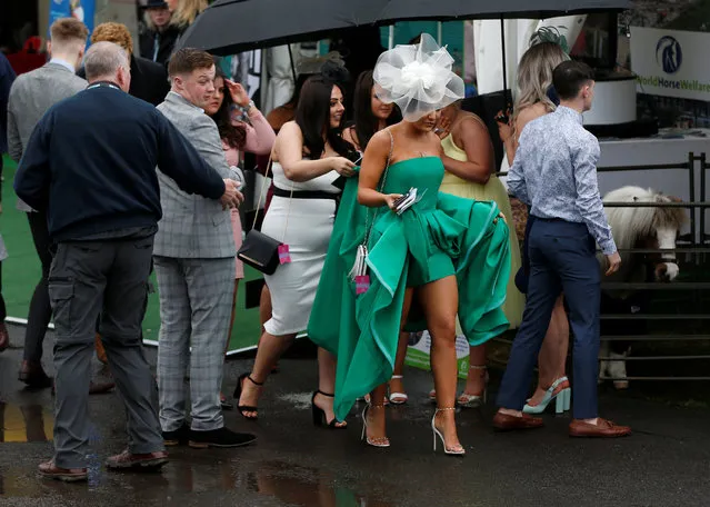 Racegoers during Ladies Day at the Grand National Festival at Aintree Racecourse on April 13, 2018 in Liverpool, England. (Photo by Andrew Yates/Reuters)