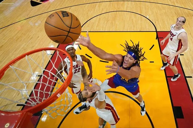 Denver Nuggets forward Aaron Gordon (50) shoots the ball against Miami Heat forward Caleb Martin (16) during the first half in game three of the 2023 NBA Finals at Kaseya Center in Miami, Florida on June 7, 2023. (Photo by Kyle Terada/USA TODAY Sports)