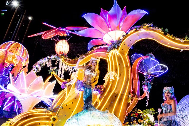 Revelers perform during the Festival of Light in San Jose, Costa Rica on December 14, 2024. (Photo by Ezequiel Becerra/AFP Photo)