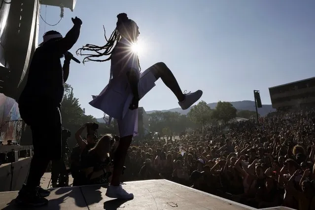 Swiss rapper KT Gorique (born Caterina Akissi Amenan Mafrici), right, performs on the main stage, during the 46th edition of the Paleo Festival, in Nyon, Switzerland, Wednesday, July 19, 2023. The Paleo is an open-air music festival in the western part of Switzerland with about 250'000 spectators in six days and will take place from 18th to 23rd July. (Photo by Salvatore Di Nolfi/Keystone via AP Photo)