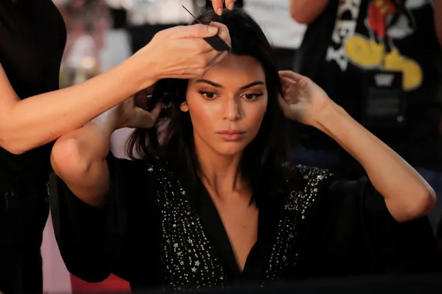 Kendall Jenner is prepared backstage during the Victoria's Secret fashion show in the Manhattan borough of New York City, U.S., November 8, 2018. (Photo by Caitlin Ochs/Reuters)