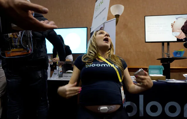 McCall Peck, 8 months pregnant, shows off the Bloomlife Smart Pregnancy Tracker stuck to her belly which tracks and counts labor contractions at home at CES in Las Vegas, January 3, 2017. (Photo by Rick Wilking/Reuters)