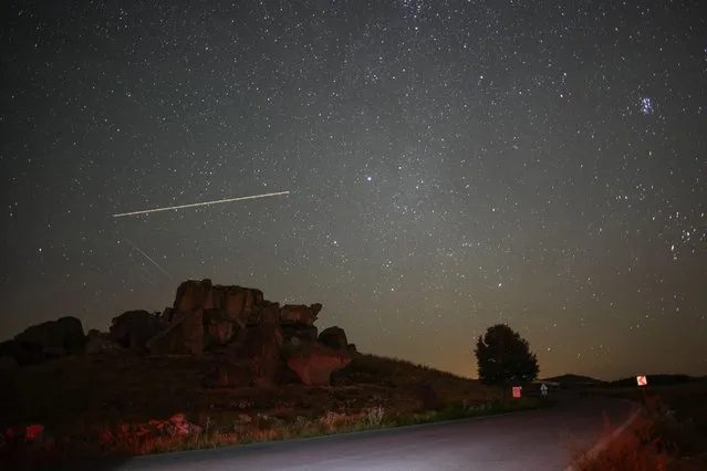 People visit the Phrygian Valley in Afyonkarahisar, 250 km south-west of Ankara, to watch the Perseid meteor shower, Saturday, August 12, 2023. (Photo by Emrah Gurel/AP Photo)