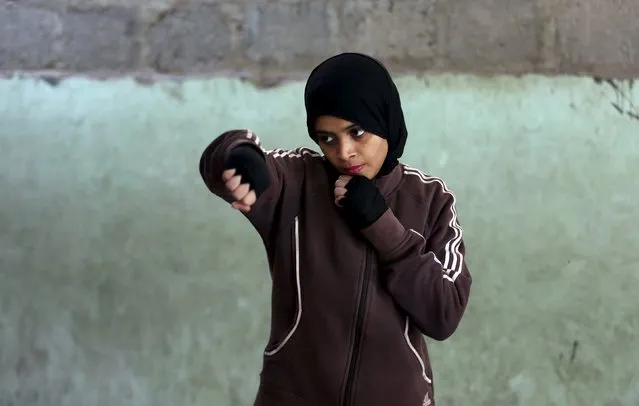 Misbah, 17, takes part in warm up exercises at the first women's boxing coaching camp in Karachi, Pakistan February 19, 2016. (Photo by Akhtar Soomro/Reuters)