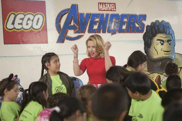 Actor Scarlett Johansson, from the upcoming film “Avengers: Endgame” appears with kids at an event promoting the Universe Unites Charity at Disney California Adventure Park on Friday, April 5, 2019, in Anaheim, Calif. (Photo by Richard Shotwell/Invision/AP Photo)