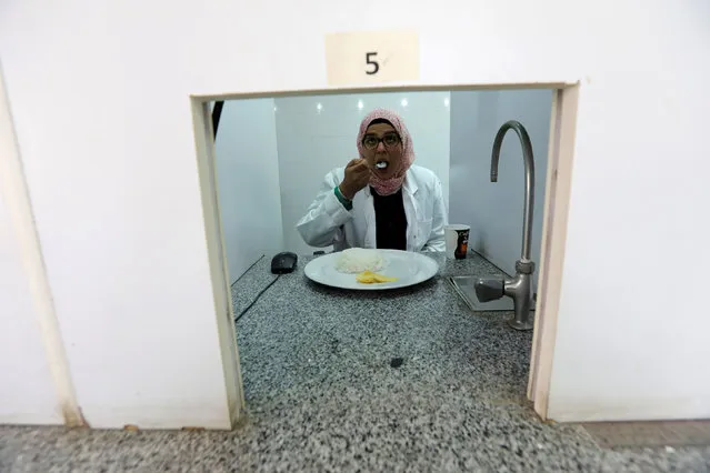 Food scientist taste samples of rice to make sure they fit Egyptian standards, in a research centre affiliated with Egypt's agriculture ministry in Cairo, Egypt, March 25, 2019. (Photo by Mohamed Abd El Ghany/Reuters)