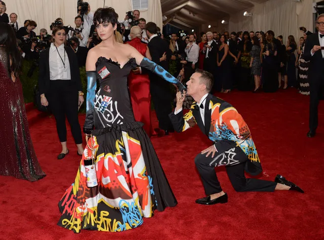 Katy Perry and Jeremy Scott arrives at The Metropolitan Museum of Art's Costume Institute benefit gala celebrating “China: Through the Looking Glass” on Monday, May 4, 2015, in New York. (Photo by Evan Agostini/Invision/AP Photo)