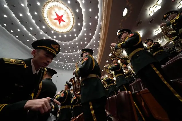 Chinese military band members rehearse, before the opening session of the Chinese People's Political Consultative Conference, or CPPCC, in the Great Hall of the People in Beijing, Monday, March 4, 2024. (Photo by Ng Han Guan/AP Photo)