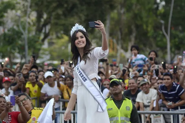 Miss Universe 2015 Paulina Vega of Colombia takes a “selfie” with her fans upon her arrival at Barranquilla May 1, 2015. (Photo by Alfonso Cervantes/Reuters)