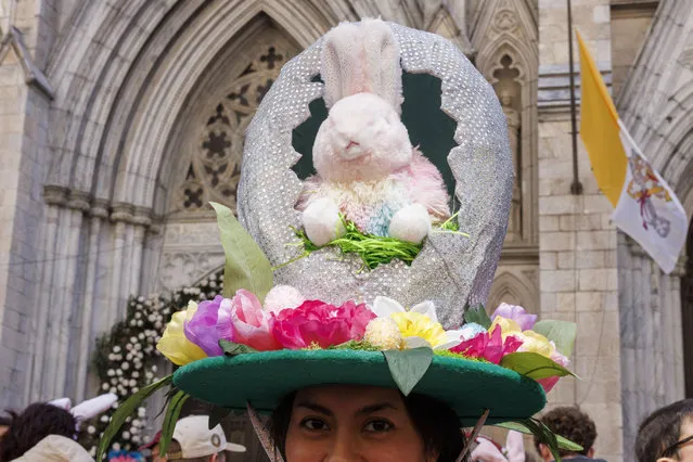 A participant dressed in colorful Easter fashion attends the annual Easter Parade and Bonnet Festival in front of St. Patrick's Cathedral on Fifth Avenue in New York, New York, USA, 31 March 2024. (Photo by Sarah Yenesel/EPA/EFE/Rex Features/Shutterstock)