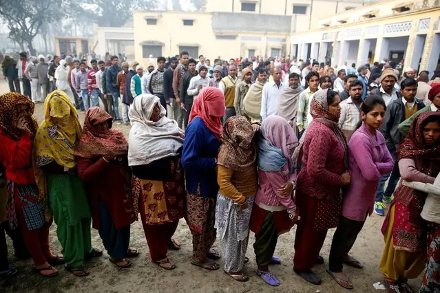 People queue to vote during the state assembly election, in the town of Deoband, in the state of Uttar Pradesh, India, February 15, 2017. (Photo by Cathal McNaughton/Reuters)