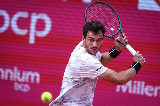 Pedro Martinez of Spain in action against Hubert Hurkacz of Poland during the final match of the Estoril Open tennis tournament, in Cascais, Portugal, 07 April 2024. (Photo by Rodrigo Antunes/EPA)