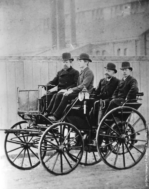 German car manufacturers Wilhelm Maybach and Paul Daimler in the first four-wheeled Daimler car, 1895