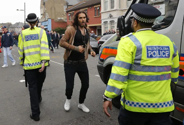 Britain Soccer Football, West Ham United vs Manchester United, Barclays Premier League, Old Trafford on May 10, 2016. West Ham fan Russell Brand runs to the stadium before the match. (Photo by Eddie Keogh/Reuters/Livepic)