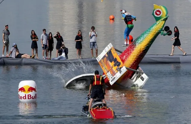 A craft falls into the water during the Red Bull Flugtag Russia 2015 competition in Moscow, Russia, July 26, 2015. (Photo by Sergei Karpukhin/Reuters)