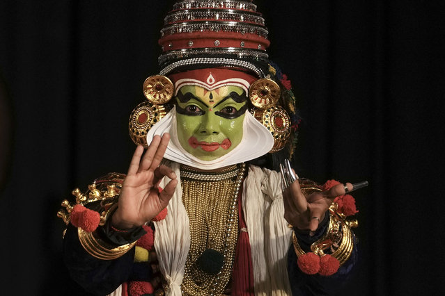 An artist performs Kathakali, a traditional classical dance which originated in India's southern Kerala state, during a show at a cultural festival Onam in Chennai, India, Thursday, September 12, 2024. (Photo by Mahesh Kumar A./AP Photo)