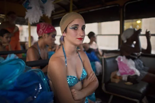 Dancer Yeni Acosta, 19, waits to perform at a carnival parade in Havana, Cuba August 7, 2015. (Photo by Alexandre Meneghini/Reuters)