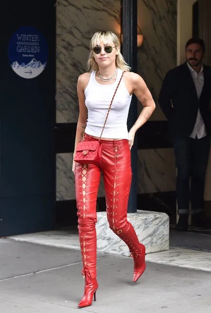 Miley Cyrus looks hot in Red Leather trousers and a white top with no bra as she makes her way to Marc Jacobs fashion show in New York on February 12, 2020. (Photo by New Media Images/Splash News and Pictures)