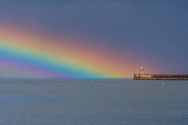 A prominent rainbow appears over Tynemouth, United Kingdom after a morning of rain on May 25, 2022. (Photo by John Fatkin/Cover Images)