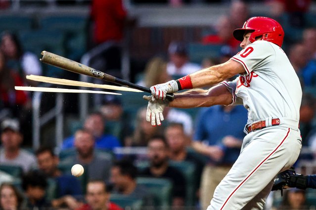 J.T. Realmuto #10 of the Philadelphia Phillies breaks his bat into three pieces on a 3-1 count cutter from Jake Odorizzi #12 of the Atlanta Braves in the top of the second inning during a game at Truist Park on September 17, 2022 in Atlanta, Georgia. (Photo by Casey Sykes/Getty Images)