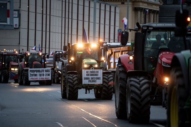 Hundreds of Czech farmers with their tractors block a road in downtown during a farmers' protest in Prague, Czech Republic on February 19, 2024. The protest began early morning with drivers blocking both directions on a key road near Czech Agriculture Ministry (road Wilsonova). (Photo by Lukas Kabon/Anadolu via Getty Images)