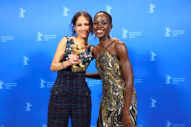 Director Mati Diop poses with the Golden Bear for Best Film for “Dahomey”, next to Jury President, Kenyan-Mexican actress Lupita Nyong'o, backstage during the awards ceremony at the 74th Berlinale International Film Festival in Berlin, Germany, on February 24, 2024. (Photo by Nadja Wohlleben/Reuters)