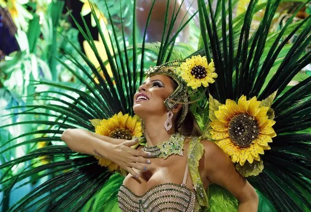 A reveller from the Vila Isabel samba school participates in the annual Carnival parade in Rio de Janeiro's Sambadrome February 12, 2013. (Photo by Sergio Moraes/Reuters)