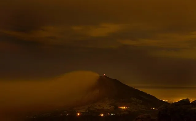 View of the Turrialba volcano in Cartago, 35 Km east of San Jose, on September 19, 2016. The Costa Rican authorities suspended operations at the country's main airport Monday after the nearby Turrialba volcano erupted, sending a thick ash cloud into the sky. Turrialba erupted twice Monday, first at dawn and again just before noon. The second eruption sent an ash cloud 4,000 meters (13,000 feet) into the air. (Photo by Ezequiel Becerra/AFP Photo)