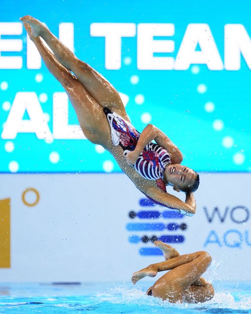 Team United States compete in the team free final of artistic swimming at the World Aquatics Championships in Singapore, Sunday, July 20, 2025. (Photo by Vincent Thian/AP Photo)